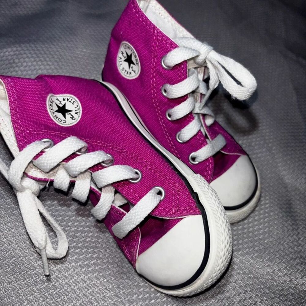 Magenta toddler girl Converse All Star high top sneakers